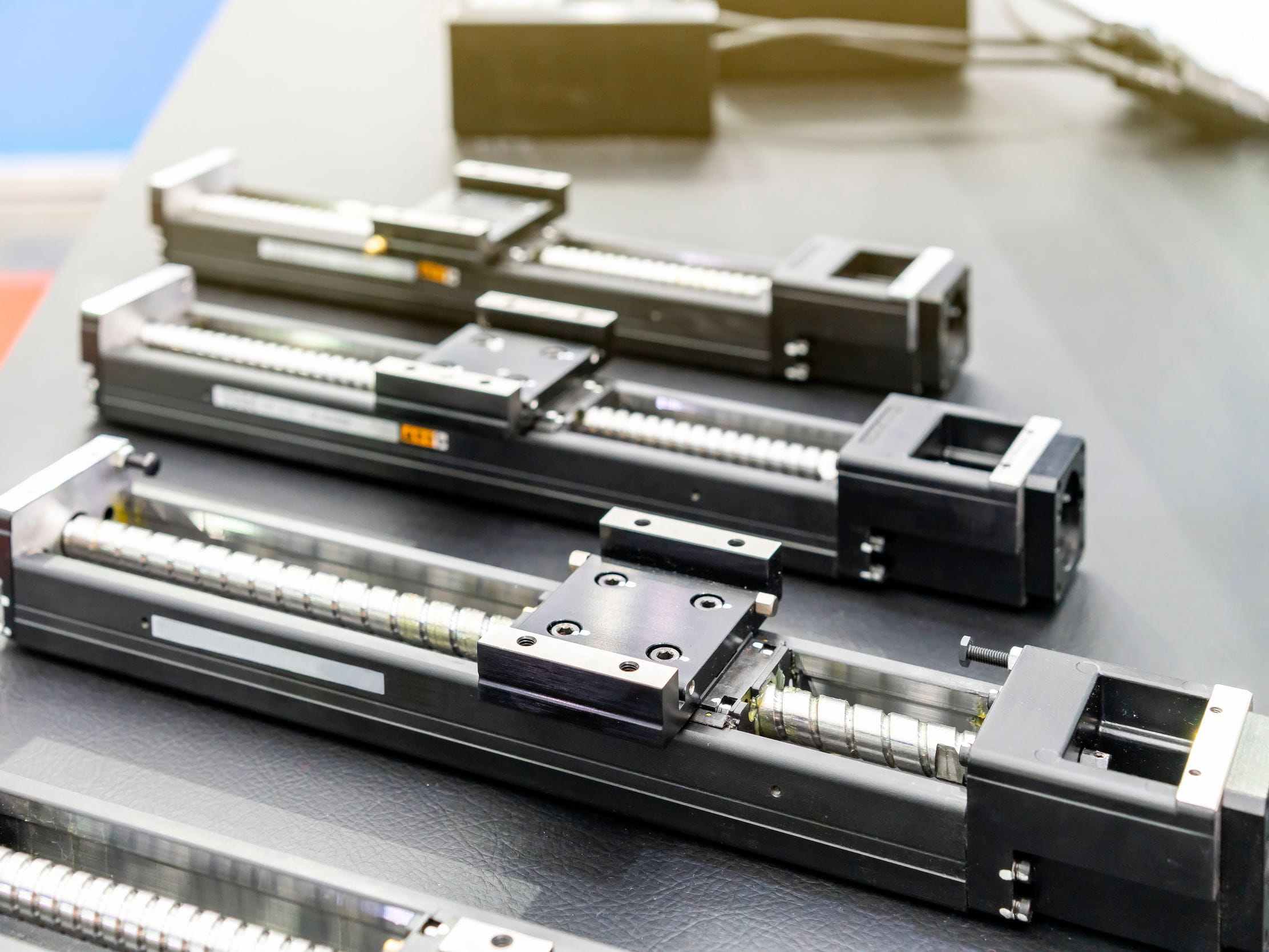 Close up high quality and precision linear bushing drive or lead screw ball bearing of machine on table for industrial work